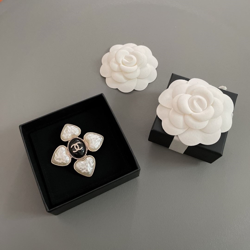 Ch*el brooches